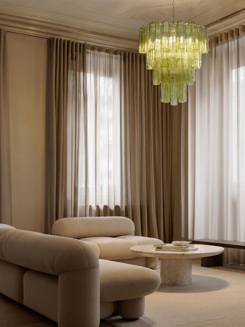 80 green Murano glass tube chandelier hanging in livingroom